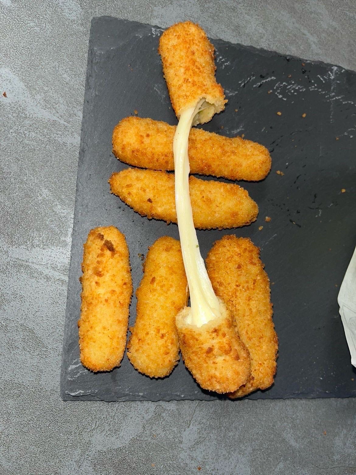 Mozzarella sticks filants